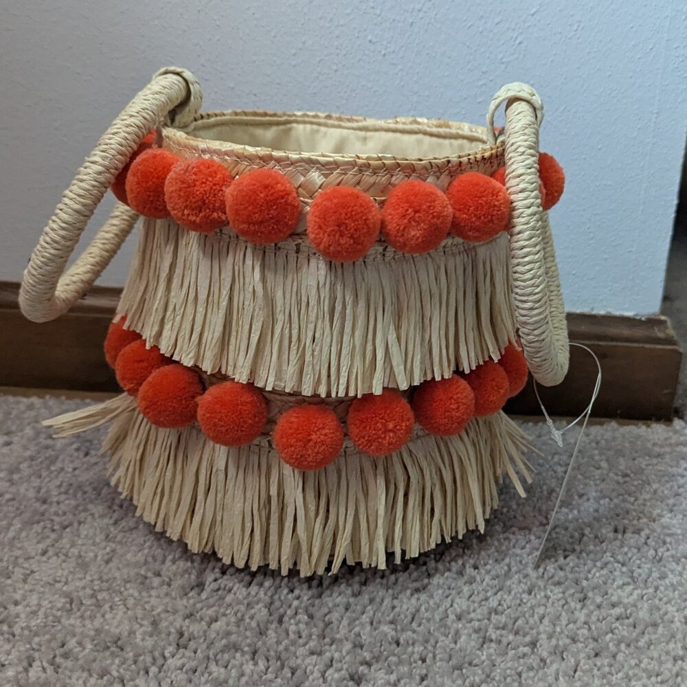 Versona Straw Bag with Orange Pom Poms